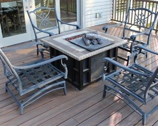 Agio fire pit with four chairs.