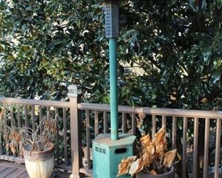 Propane heater with two large planters.  
