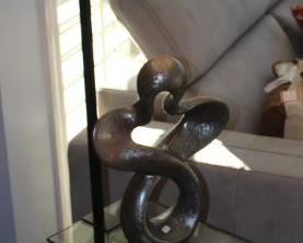 Glass top, floor lamp shown with Mikasa sculpture.  