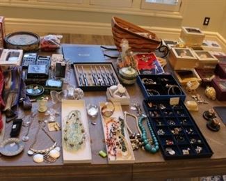 Our goodie table has costume jewelry, Cutco steak knives, designer ties, Wedgwood, ChemArt and Baldwin Christmas ornaments, sports memorabilia and more.  