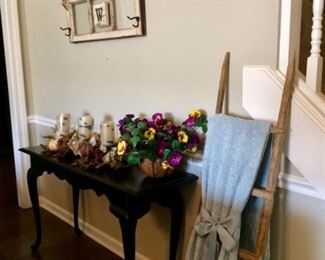 console table        step ladder with blanket