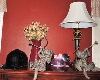 cherubs, equestrian helmet, floral display, Minnie Mouse glitter hat, table lamps