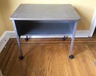 Small Metal Desk on Wheels https://ctbids.com/#!/description/share/315391