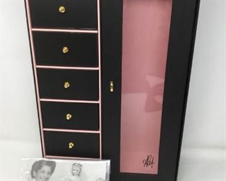 Madame Alexander doll wardrobe
 https://ctbids.com/#!/description/share/315501