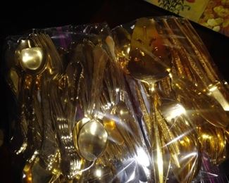 Several flatware sets