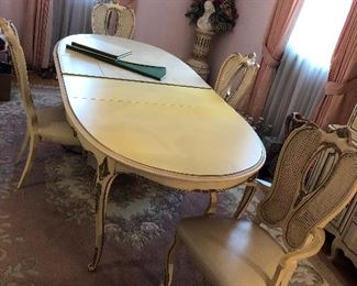 Dining Table (66"L x 43"W), 2 chairs, 2 captains chairs, 2 leaves (15")