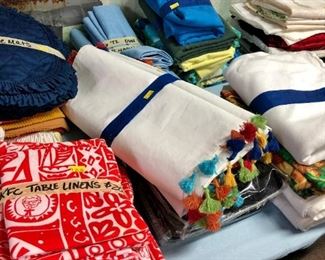 KFC linens, lots of table cloths, round and rectangular. Table runners. Some nice vintage pieces