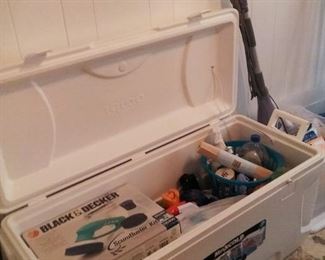 Large never been used large cooler filled with  separate cleaning supplies for sale 