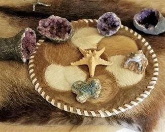 amethystos you see in the photo:
Amethyst is a well known mineral and gemstone. It is the purple variety of the mineral Quartz, and its most valuable and prized variety. Its name derives from the Greek "amethystos", which means "not drunken", as Amethyst in antiquity was thought to ward off drunkenness.