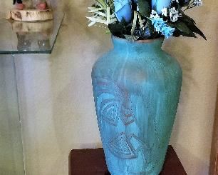 Large blue vase and wood side table