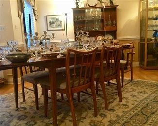 Mid-Century dining table and chairs along with china and crystal from the same era