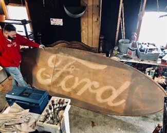 Large (around 12' long) plywood Ford sign.  Not sure if this was a sign at one time, or something to transport a sign makers Ford script template.  No matter what, it's a cool piece!