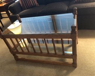 spindle coffee table with glass display shelf