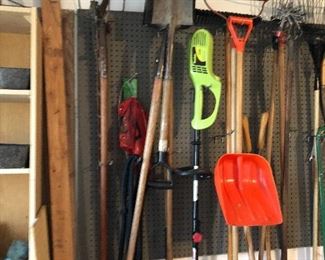 assorted lawn tools including electric trimmer
