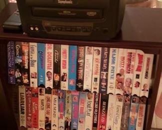 VHS tapes (many good movies) with a small tv with a vhs player