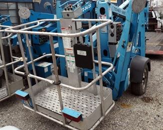 Genie TZ-34/20 Towable Trailer Mounted 3500 Pound Boom Lift, Battery Operated, Single Axle, 4 Outriggers, Maximum Load 460 Pounds, 40' Max Working
