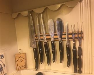 Vintage "Cutco" swirl handle knife set. Includes steak knives, spreader knives, forks, etc. 