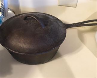 Large vintage cast iron pan with lid
