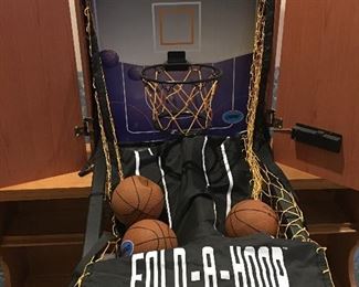 Fold-A-Hoop basketball game. Just hang on your wall and let the kids have lots of fun shooting baskets.
