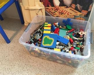 Here is a whole tub of Legos. Kids can build almost anything with all these Legos.