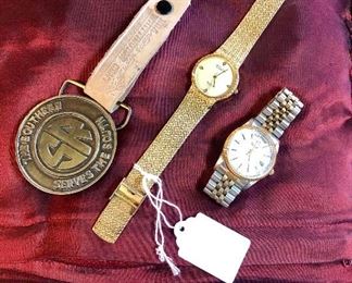 "ELGIN" Water Resistant 100 Ft Men's Quartz Watch, "DUFONTE" Lucien Piccard Men's Gold-Toned Watch, and c.1974 "SOUTHERN RAILROAD" Brass Buckle attached to an NRA Leather Strap