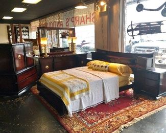 "CORDOVAN" by Kent Coffey, Full Size Bed with Built-in Night Stands on Headboard, Dresser with Large Mirror, and a beautiful 2-Door / 5-Drawer Chest. 