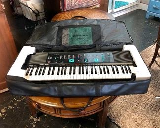 YAMAHA PORTATONE PSR-80 Electric Keyboard with original paperwork and in a black carrying case