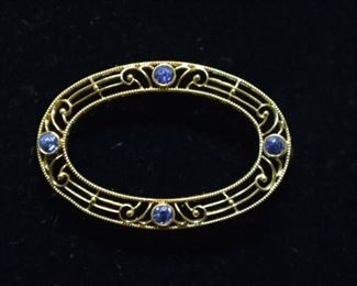 sapphire gold brooch