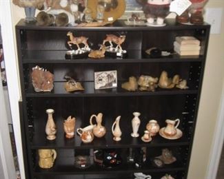 Alaska souvenirs including native clay pottery, fur animals, dolls and more.