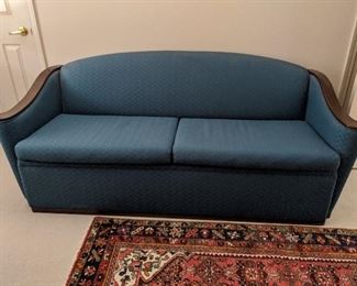 $100  Blue cloth loveseat