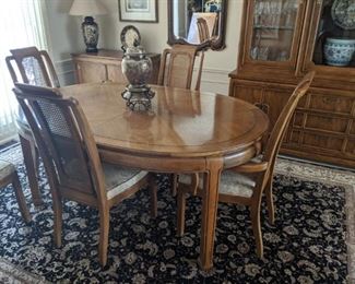 $350  Oval dining room table with 6 chairs and one 20" leaf. Measures 44" x 66"