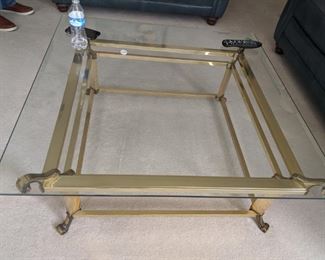 $90   Glass top table with brass base