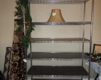 Metal shelving unit on rollers