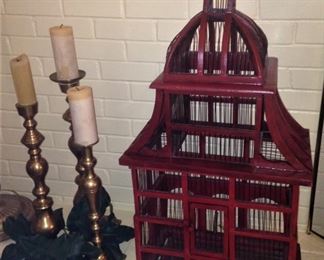 Brass candle holders; decorative red bird cage