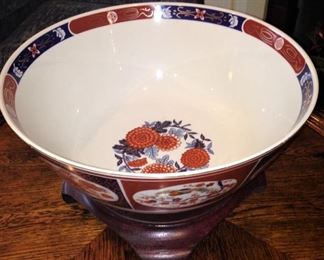 Asian style bowl with wooden display base