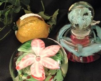 Colorful paperweights and perfume bottle