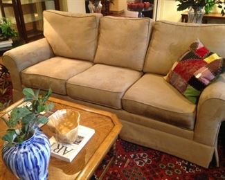 3-cushion sofa; patchwork pillow; large coffee table
