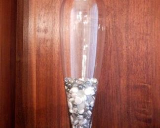 Tall clear vase with opalescent stones. 20" tall