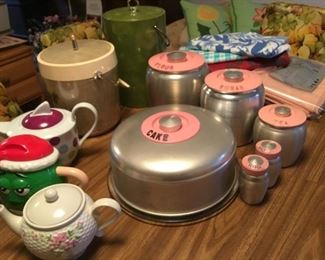 Teapots, Vintage Kromex Aluminum Cake, Canister, Salt and Pepper Set, Vintage Ice Buckets, Table Linens.
