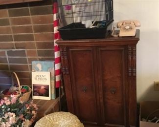American Flag, Foot stool, Antique Radio Cabinet (radio components removed), Bird Cage, Vintage Rotary Dial Phone.