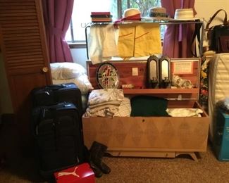 2 Suitcases, Lane Cedar Chest, Bed Linens, Wall Sconce Candle Holders, Stained Glass Window Hanging, Straw Hats, Silk Stockings in box, Slip, Aprons.