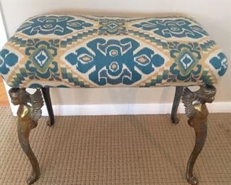 Decorative stool with brass angel figurines