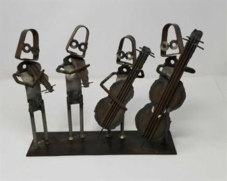 Signed folk art metal sculpture