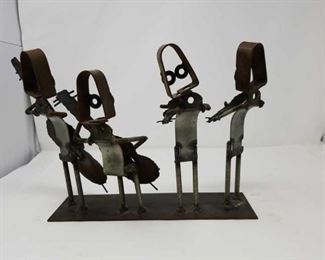 Signed folk art metal sculpture