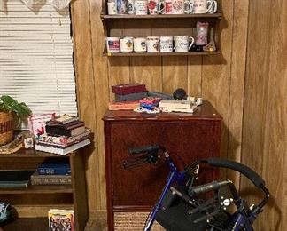 Drive Walker Chair, Cabinet, Games, Assorted Coffee Cups, Book Shelves, Assorted Books