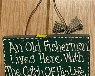 Wall Plaque "An Old Fisherman Lives Here With The Catch of His Life"