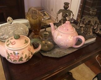 Teapots and Brass candelabras 