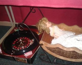 doll, sled and roulette wheel