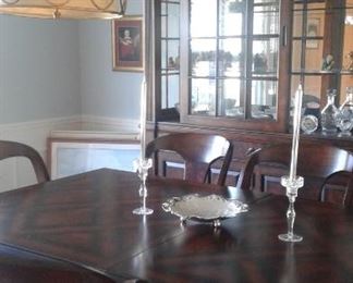 Dining Room Table, 8 chairs, leaves, pads and china closet