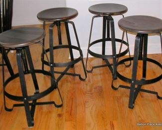 Four Wrought Metal and wood topped Bar stools. 